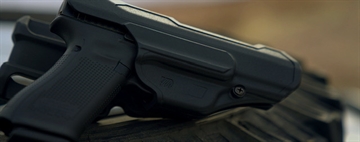 Picture of BLACKHAWK T-Series L2D, Duty Holster, Right Hand, Black, Fits Glock 17/22/31 With TLR1/TLR2, Includes Jacket Slot Belt Loop 44N200BKR