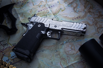 Picture of SPRINGFIELD ARMORY PRODIGY 9MM CNC/IRON MONKEY EDITION CHROME TOPO ENGRAVED/BLK 1-50 UNITS PRODXIM