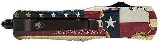Picture of Templar Knife Gen II Texan Large 3.50" OTF Drop Point Part Serrated Black Oxide Stonewashed 440C SS Blade, 5.25" Texas Flag Aluminum Handle, Glass Breaker LTX631